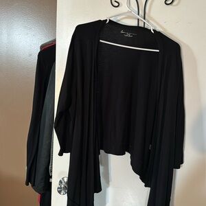 Black shrug with 3/4 sleeve.